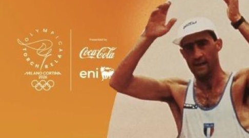 Maurizio Damilano tedoforo della fiaccola olimpica